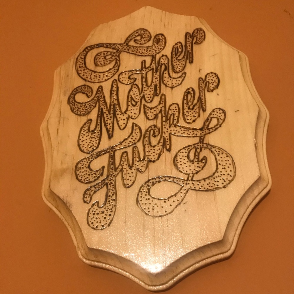 Explicit handmade wooden plaque